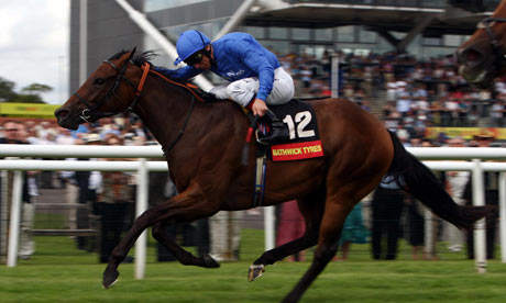 Sand Vixen ridden by Frankie Dettori on their way to victory in the St Hugh's Stakes