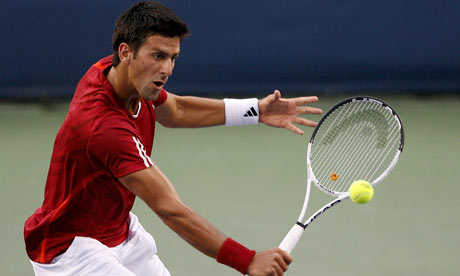 novak djokovic fotos. Novak Djokovic hits a return