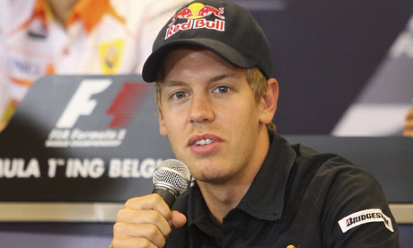 Sebastian Vettel defended his forceful tactics against Jenson Button at the