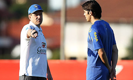 Dunga, left, speaks to Kaka during a Brazil training session on Wednesday