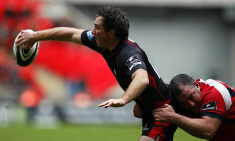 Saracens' Glen Jackson is tackled by Adam Black of Worcester at Wembley