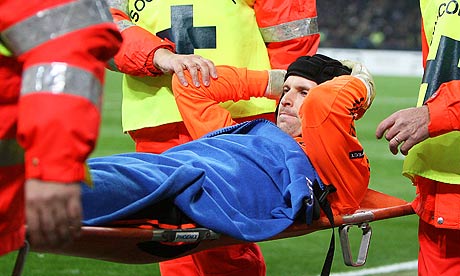 Petr Cech is carried off the pitch during Chelsea's 2-1 defeat to Internazionale at San Siro