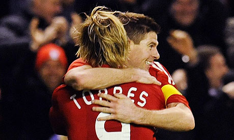 Fernando Torres and Steven Gerrard celebrate Liverpool's 3-0 win against Lille in the Europa League