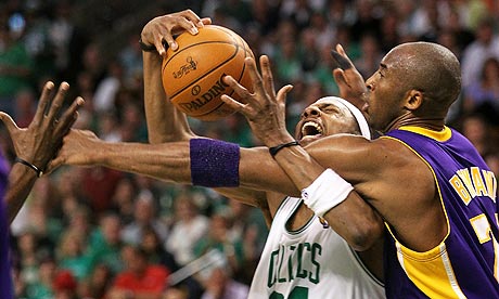 Kobe Bryant, right, tangles with Paul Pierce, during Boston's game-five 