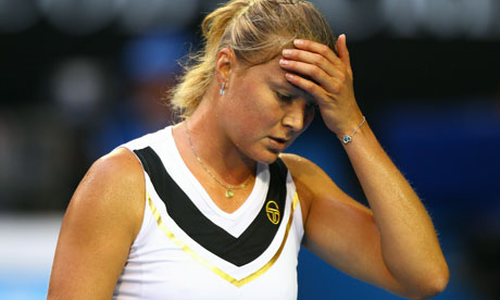 Dinara Safina of Russia feels the pressure in her 6-0, 6-0 defeat to Kim Clijsters of Belgium