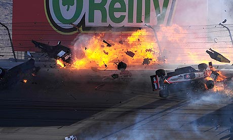 Dan Wheldon's car bursts into flames in the pileup during the Las Vegas 