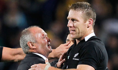 Brad Thorn, right, is congratulated by the New Zealand coach Graham Henry