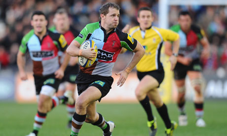 Nick Evans of Harlequins makes a break during their Premiership match against Newcastle Falcons