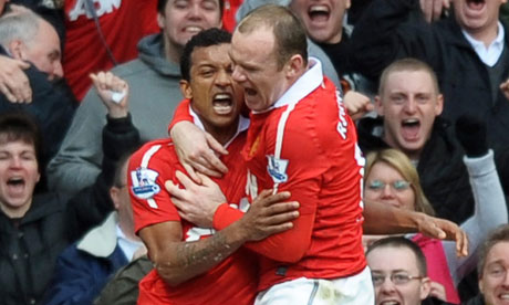 Manchester United's Wayne Rooney right celebrates with Nani after the 