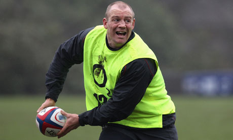 Mike Tindall holds on to the ball during an England training session in Bagshot