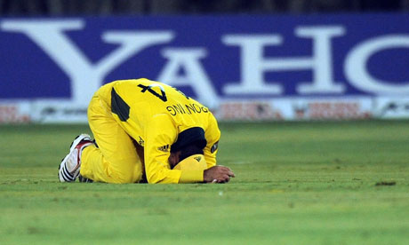 The Australia captain Ricky Ponting fails to stop a boundary by Indian batsman Yuvraj Singh