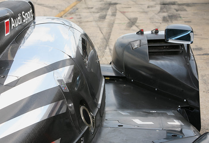 Audi R18 Testing: Close up view of the Audi R18's fuel input valve and front wing air vent 