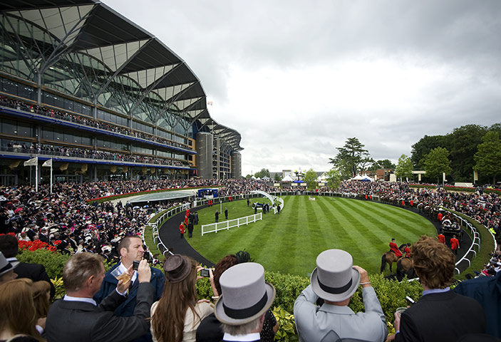 Ascot day 4: A full crowd around the parade ring for the arrival of the royal carriages