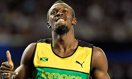 Usain Bolt celebrates winning the 200m in Daegu