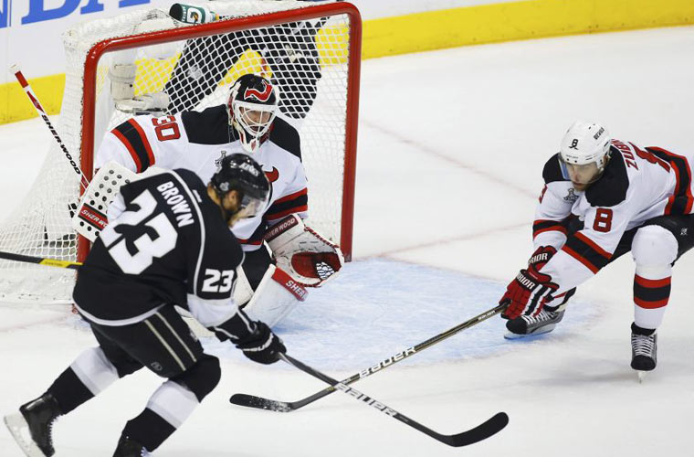 Los Angeles Kings' Dustin Brown (23) shoots to score
