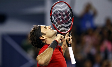 Roger Federer celebrates after defeating Gilles Simon in the final of the Shanghai Masters