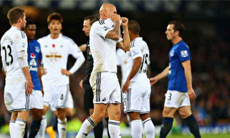 Swansea City's Jonjo Shelvey walks after being sent against Everton in the Premier League