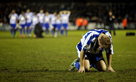 Worcester City's Danny Jackman contemplates his missed penalty in the shootout against Scunthorpe at