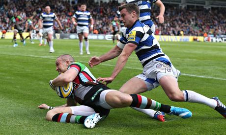 Harlequins' Mike Brown dives over to score the first try against Bath in the Premiership