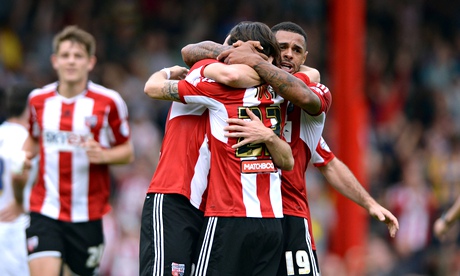 Jota Peleteiro, centre, celebrates scoring the first goal for Brentford against Leeds United