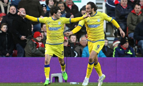 Sheffield Wednesday's Kieran Lee, left, celebrates scoring at Nottingham Forest in the Championship