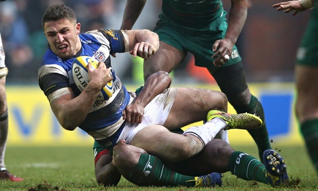 Bath's Sam Burgess is tackled in the game against Leicester in January