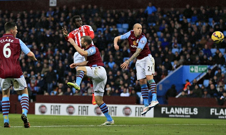 Stoke City's Mame Biram Diouf scores against Aston Villa in the Premier League match at Villa Park