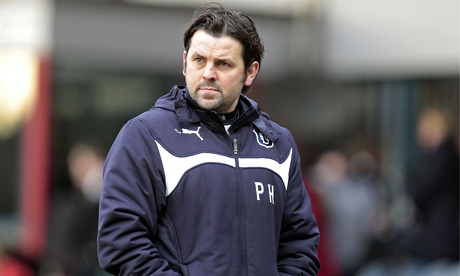 Dundee manager Paul Hartley watched his side beat Motherwell in the Scottish Premiership match