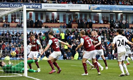 Swansea's Jack Cork's shot is deflected by Burnley's Kieran Trippier in the Premier League match