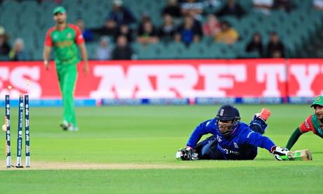 Chris Jordan of England watches as he is run out in the Cricket World Cup match against Bangladesh