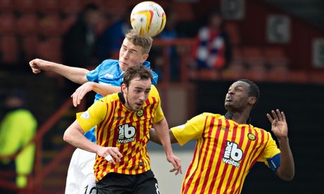 Partick's goalscorer Stuart Bannigan, centre, and St Johnstone's David Wotherspoon at Firhill
