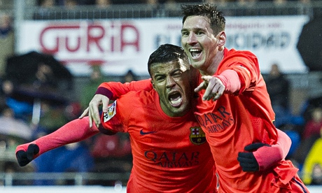 Barcelona's two-goal Lionel Messi, right, celebrates with Rafinha against Eibar.