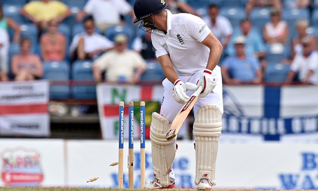 England's batsman Jonathan Trott is bowled by the West Indies bowler Shannon Gabriel