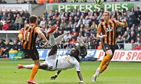 Bafétimbi Gomis scores Swansea's second goal against Hull City in the Premier League match