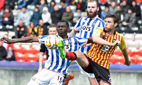Kilmarnock's two goal hero Tope Obadeyi, left, battles with Partick's Stephen O'Donnell at Firhill