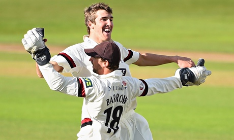Craig Overton of Somerset celebrates the wicket of Nottinghamshire's Samit Patel with Alex Barrow