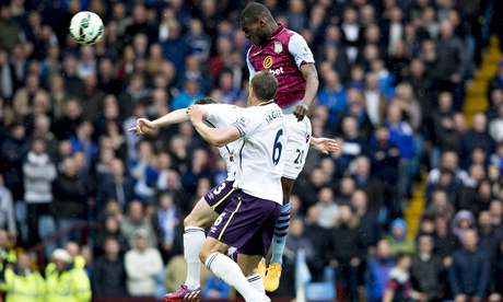 Christian Benteke scores Aston Villa's first goal against Everton in the Premier League