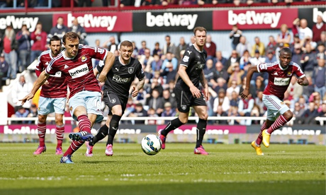 Mark Noble scores with a penalty for West Ham against Burnley in the Premier League at Upton Park