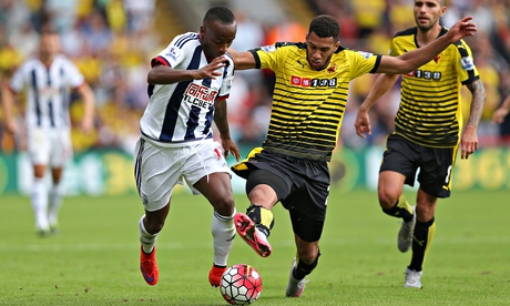 Watford's Étienne Capoue, right, in action with West Brom's Saido Berahino in the Premier League