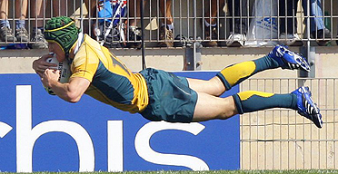 Matt Giteau dives in to score for Australia