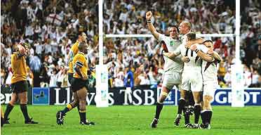 Martin Johnson celebrates England's world cup win against Australia