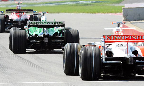Cars leave the pits during practice at the Canadian grand prix