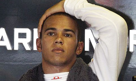 Lewis Hamilton looks crestfallen following his crash in the Canadian grand 