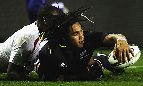 Ma'a Nonu of the All Blacks is tackled by Topsy Ojo