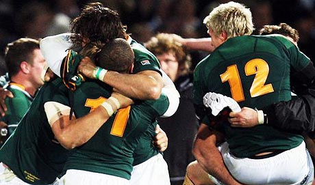 South Africa players celebrate victory over New Zealand in the Tri-Nations