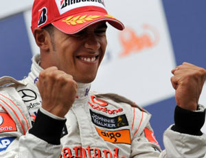 Lewis Hamilton celebrates victory in the Belgian grand prix