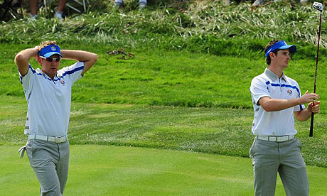 Ian Poulter and Justin Rose in action during their defeat