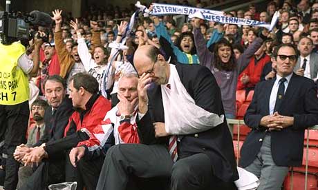 The injured Phil May looks on in despair as Wales lose to Western Samoa