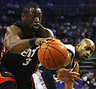 Miami Heat's Dwayne Wade and New Jersey Jets' Vince Carter