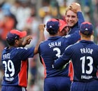 England's Stuart Broad is congraulated after bowling out India's Sachin Tendulkar in Bangalore
